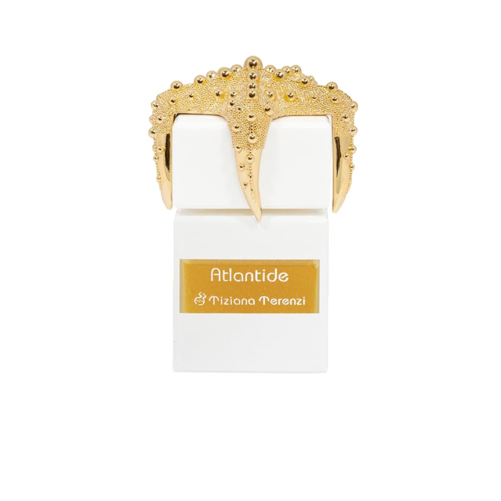 Gold ring with detailed design on a white box labeled 'Atlantide' by Tiziana Terenzi.