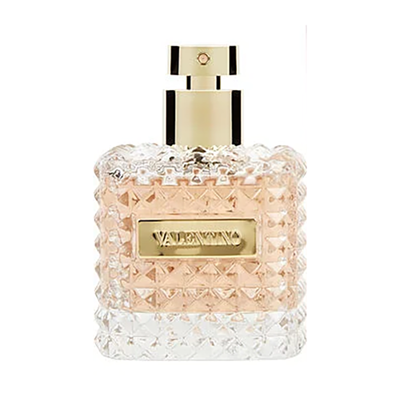 Perfume bottle with decorative design and gold accents on a white background