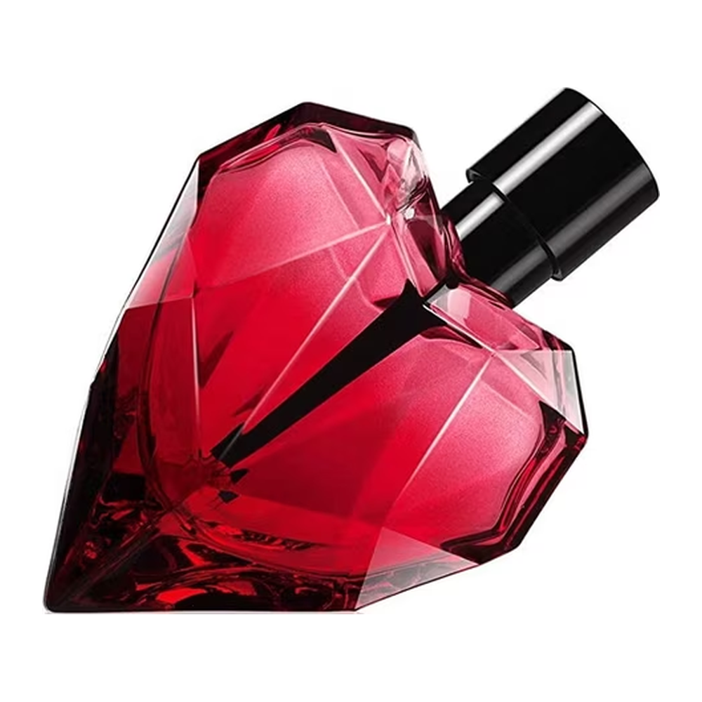 A faceted red perfume bottle with a black cylindrical cap, shown on a plain white background.