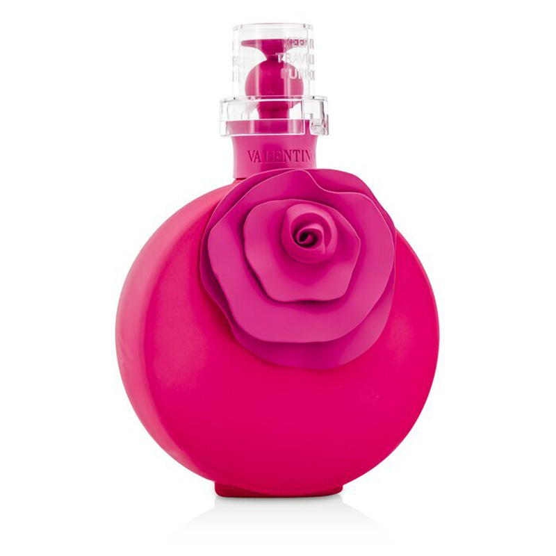 Pink rose-shaped perfume bottle on a white background